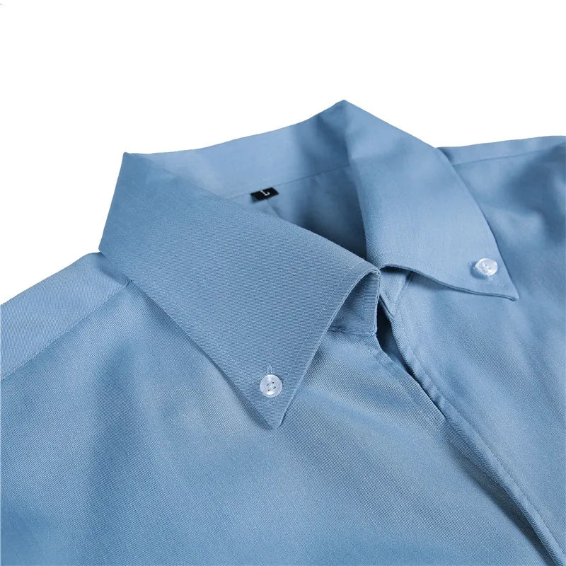 A man's light blue button down dress shirt.